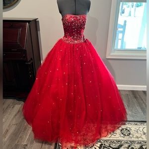 Stunning red tulle ball gown with sequin details